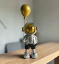 Silver Headphone boy with Balloon