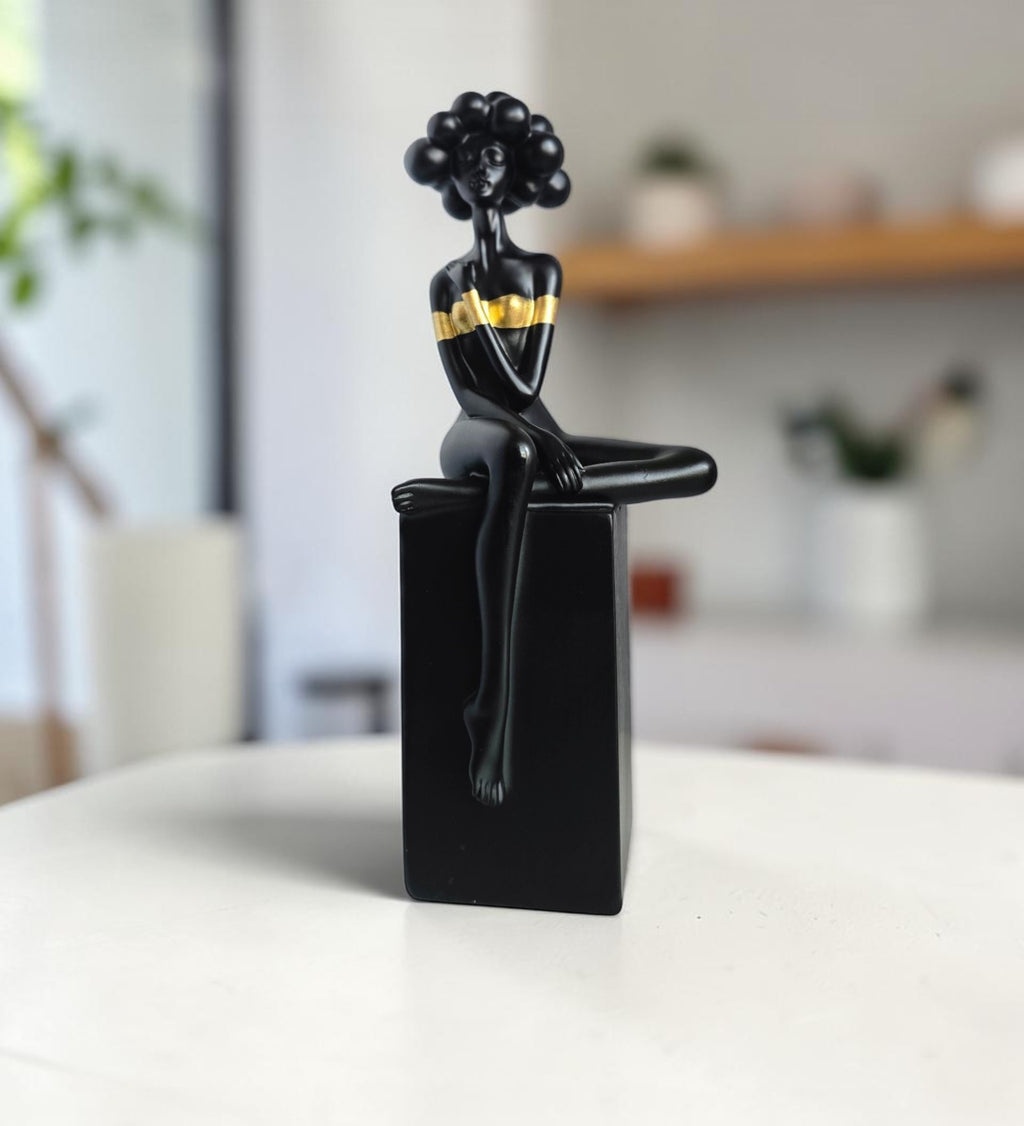 Black Bubble Hair Sitting Lady