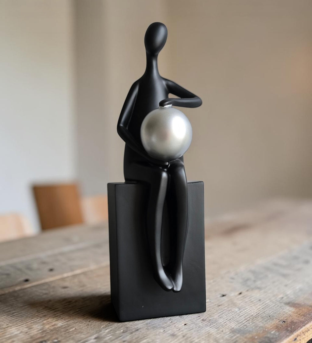Black Man with Silver Ball