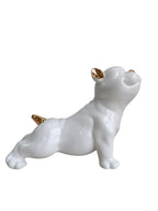 Glossy White Ceramic Puppy Figurine with Golden Accents