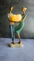Romantic Couple Holding Heart