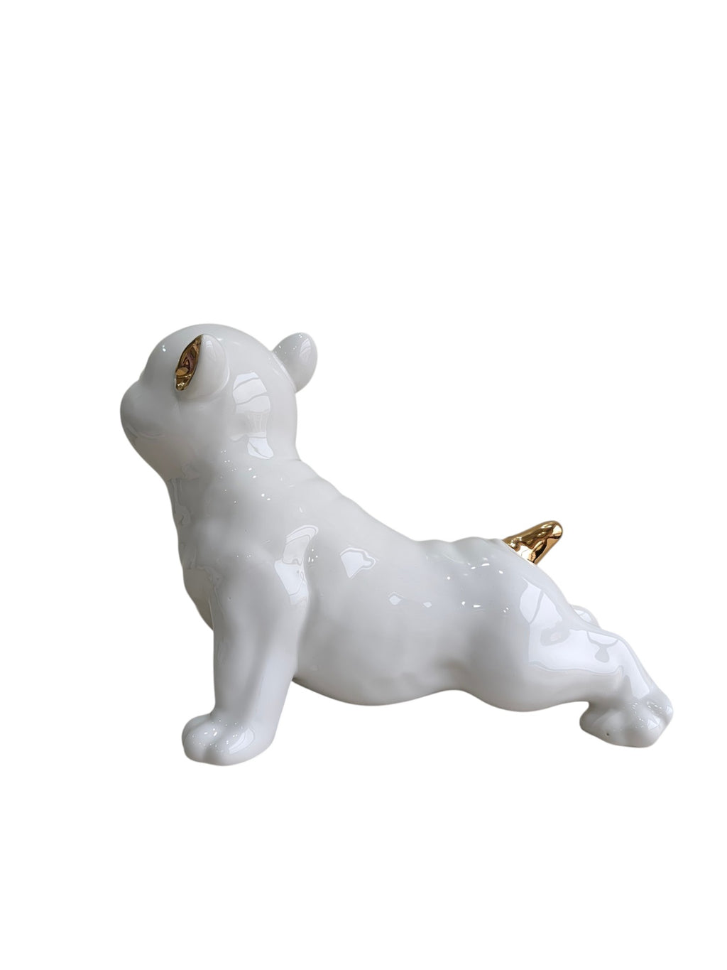 Glossy White Ceramic Puppy Figurine with Golden Accents