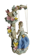 Victorian Girl on Floral Swing Showpiece - Porcelain Princess Figurine