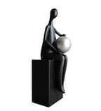 Black Man with Silver Ball