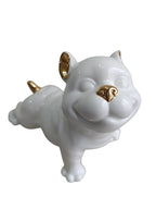 Glossy White Ceramic Puppy Figurine with Golden Accents